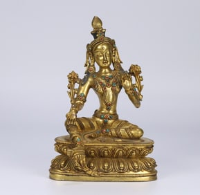 A bronze gilt turquoise coral Tara statue from the Qing Dynasty