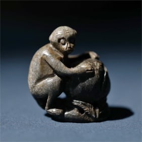 A beautiful white jade manti oil fairy monkey birthday ornament