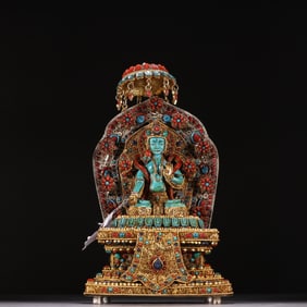 A piece of silver gilt filigree inlaid turquoise Tara from the Qing Dynasty