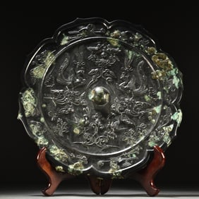 A beautiful octagonal double phoenix mirror