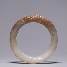 A Ming Dynasty Hetian jade bracelet with Qin twisted silk pattern
