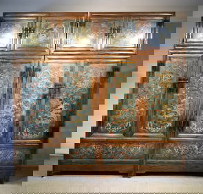 A delicate large-leaf carved cabinet filled with jasper and yellow pear
