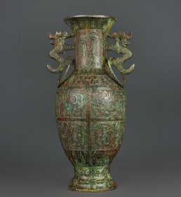 A bronze double dragon and phoenix bird pattern vase from the Han Dynasty