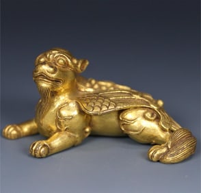 A bronze gilt beast ornament from the Qing Dynasty