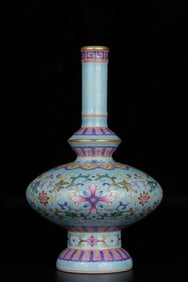 A turquoise green glazed pastel entangled flower pattern nectar bottle made in the Qianlong year of