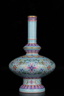 A turquoise green glazed pastel entangled flower pattern nectar bottle made in the Qianlong year of: Qing Dynasty Qianlong year turquoise green glaze pastel entwined branches floral pattern nectar bottle SIZE: H:15.5cm D:9.6cm W:324g (The Dimensions Of All Batches Are Manually Measured.If You Need Mo