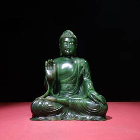 A delicate jasper seed ornament of Shakyamuni Buddha