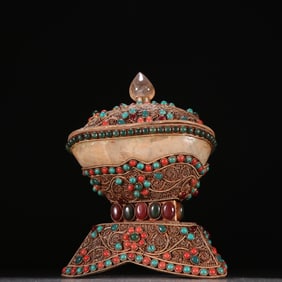 A delicate crystal filigree inlaid gemstone mop bowl