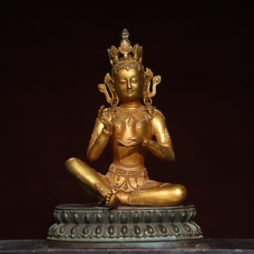 A gilded bronze statue of the Buddha Tara