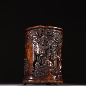 A piece of agarwood character story pen holder from the Qing Dynasty
