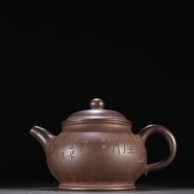 A famous purple sand carved poetry teapot