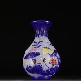 A Qing Dynasty glazed tire lotus pattern appreciation bottle