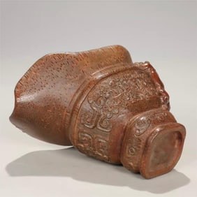 A bamboo carving of the Qing Dynasty, a dragon pattern jue cup, a bamboo carving of antiquities in
