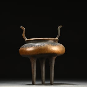 A fine three-legged incense burner with copper tires