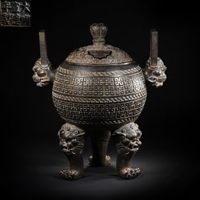 A fine three-legged tripod smoker