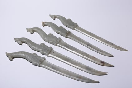 A set of Hetian jade Capricorn beast head daggers from the Qing Dynasty