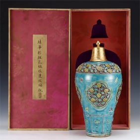 A delicate enamel pinched plum vase