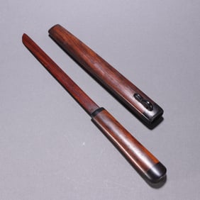 A beautiful huanghuali paper cutter