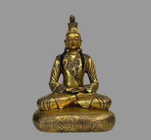 A fine copper-gilt pine zombo cloth