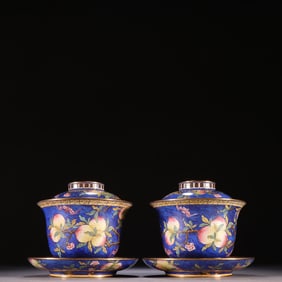 A pair of Qing Dynasty copper tire painting enamel longevity peach pattern bowls