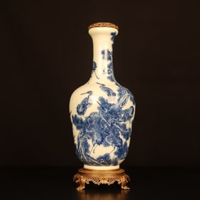 A beautiful blue and white pine crane longevity vase inlaid with copper-edged vase