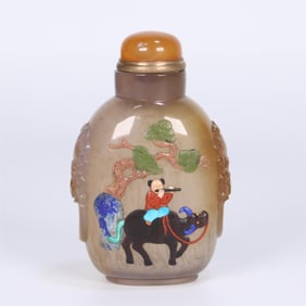 An old agate hundred treasures of the Qing Dynasty inlaid with a boy's cow snuff bottle