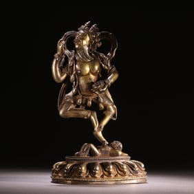 A statue of the God of Wealth in pure silver gilt in the Qing Dynasty