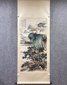 A vertical scroll of Wu Hufan's green landscape on paper