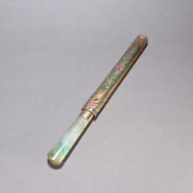 A jade-handled copper-gilt patterned dagger of the Qing Dynasty