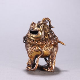 A copper-gilt lion aroma burner from the Qing Dynasty