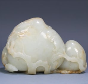 A Xinjiang Hetian jade seed material Fushou ornament in the Qing Dynasty