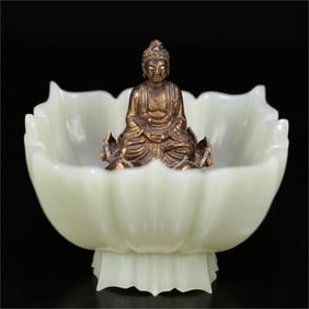A piece of Hetian jade from the Qing Dynasty with silver filigree Shakyamuni Buddha