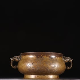 A bronze tire character story elephant ear incense burner made in the Xuande era of the Ming Dynasty