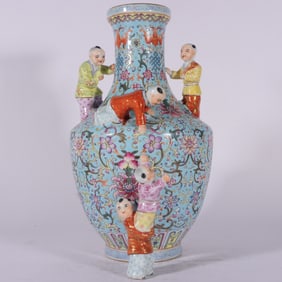 A Qing Dynasty Qianlong year enamel green ground entangled lotus five-son Denke bottle