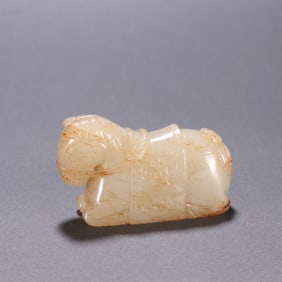A Hetian jade reclining horse ornament of the Qing Dynasty