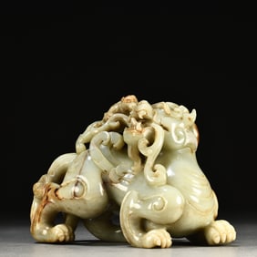 A beautiful Xinjiang topaz mother and child ornament