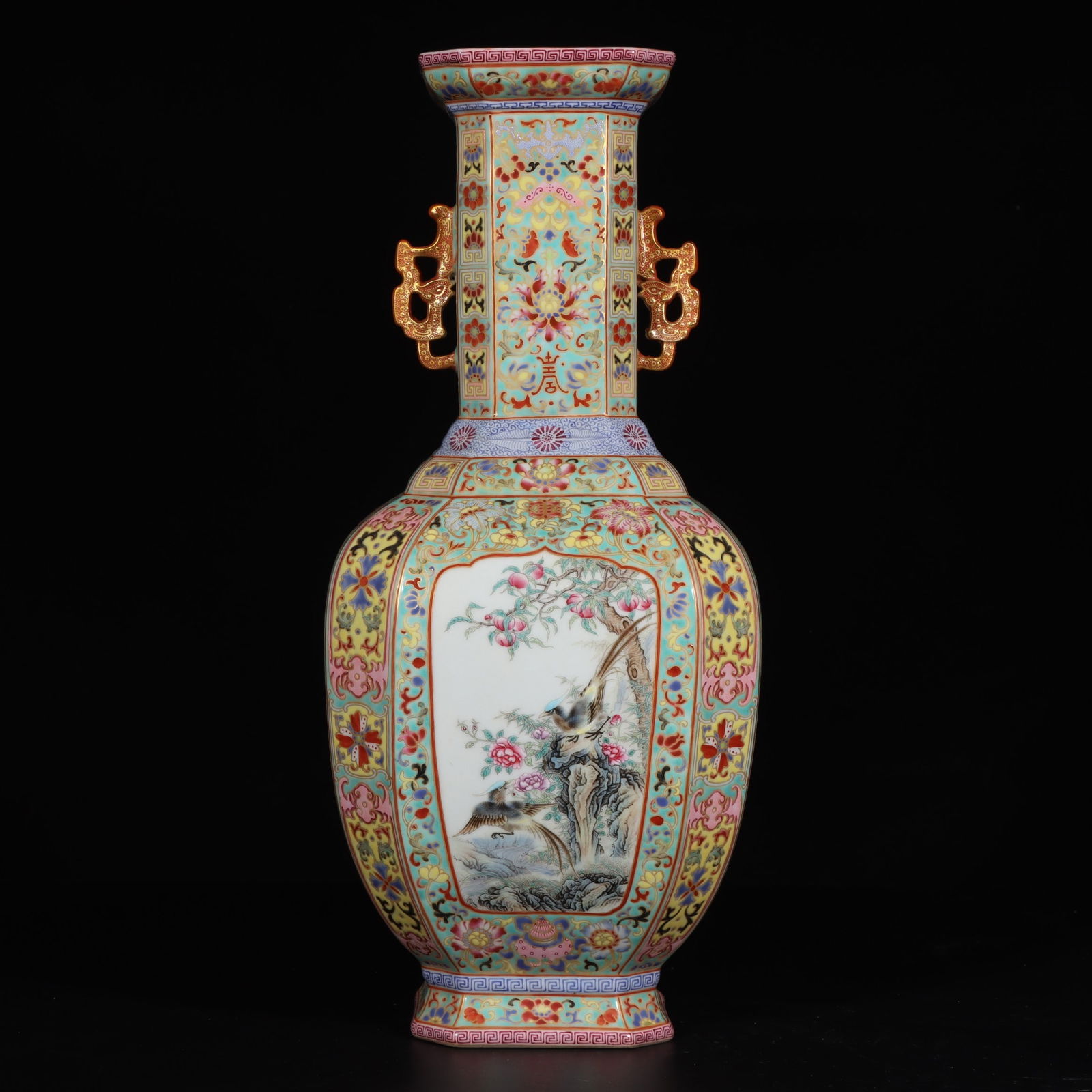 A Qing Dynasty Qianlong year made in the Qing Dynasty enamel colored gold-painted entwined lotus: Qing Dynasty Qianlong year enamel colored gold-painted entwined lotus flower pattern window flower bird pattern amphora square bottle Size: H:43.5cm Mouth D:11.1cm Bottom:11.4cm (The Dimensions Of All
