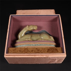 A beautiful Hetian jade lying sheep ornament