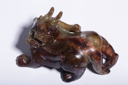 An ancient jade Pixiu handle piece of the Ming Dynasty