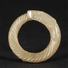 A piece of Hetian jade seed material of the Han Dynasty biting tail dragon ring