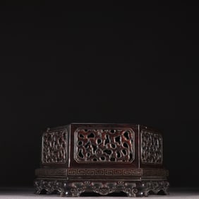 A Qing Dynasty rosewood carved auspicious cloud pattern hexagonal incense box