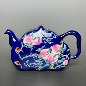 A sapphire blue enamel color eight peaches and five blessings peach shaped pot made in the Qianlong