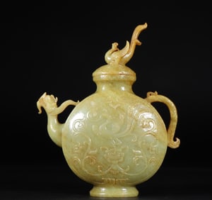 An ancient jade phoenix pattern dragon head pot of the Han Dynasty