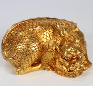 A beautiful copper-gilt unicorn ornament