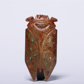An ancient jade belt of the Ming Dynasty is embedded with turquoise agate jade cicada