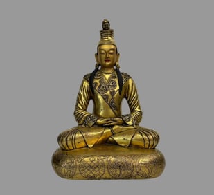 A fine copper-gilt pine zombo cloth