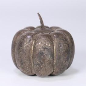 A beautiful sterling silver pumpkin jar