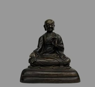 A fine alloy copper guru statue