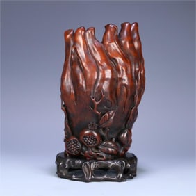 An old bamboo root carving of three Buddha's hand flower arrangements in the Qing Dynasty