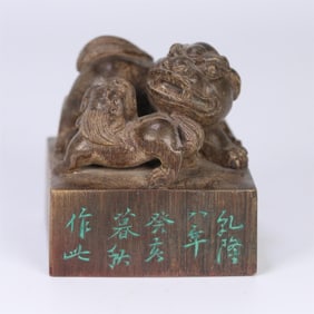 An old agarwood lion button seal of the Qing Dynasty